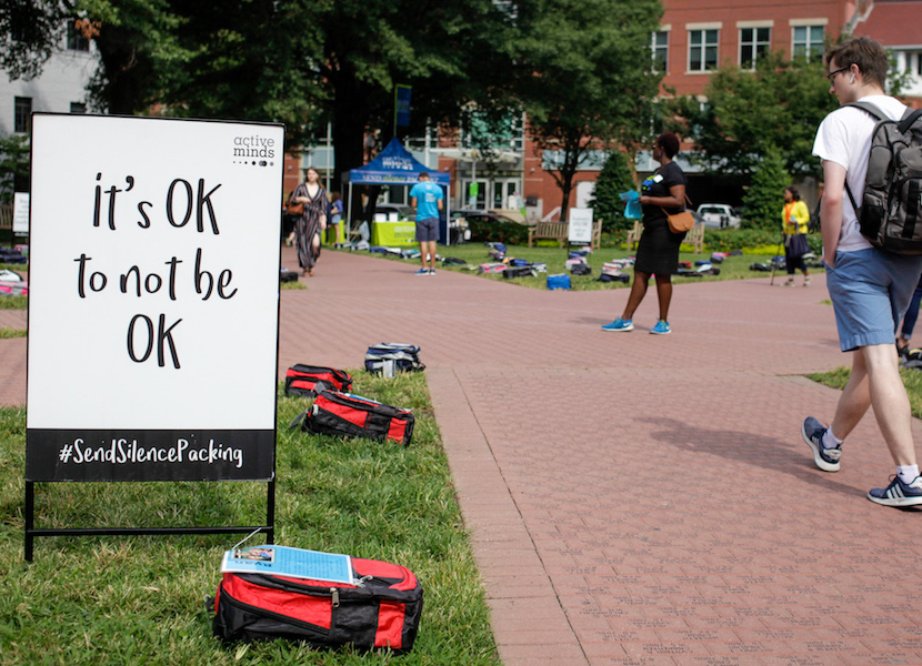 send silence packing sign and backpacks
